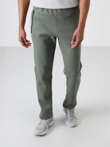 Pantaloni di Tommy Life in verde: frontale