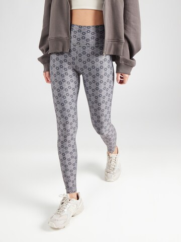 Skinny Pantalon de sport 'Mist' Athlecia en gris : devant