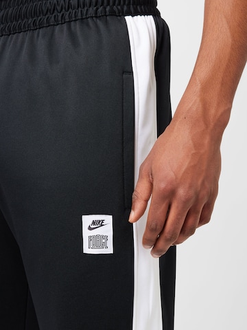 Tapered Pantaloni sport 'STARTING 5' de la NIKE pe negru