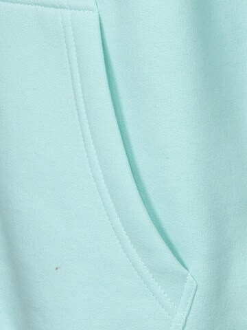 Koyumi Sweatshirt 'Free your Neck' in Groen