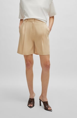 HUGO Loose fit Pants in Beige: front