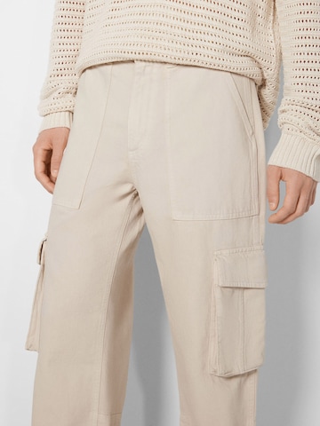 Bershka Regular Cargo trousers in Beige