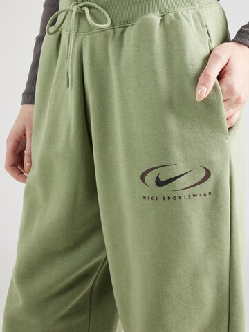 žalia Nike Sportswear Siaurėjantis Kelnės 'PHOENIX FLEECE'