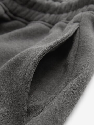 Next Дънки Tapered Leg Панталон в сиво