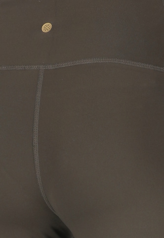 Athlecia Skinny Sportbroek 'Elli' in Bruin