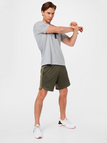 regular Pantaloni sportivi di UNDER ARMOUR in verde