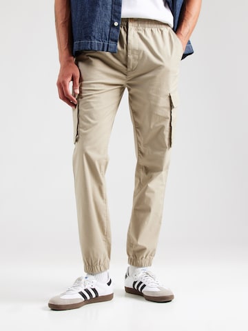 Calvin Klein Jeans - Tapered Pantalón cargo en beige: frente