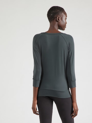 Maglia funzionale 'Flow' di CURARE Yogawear in verde