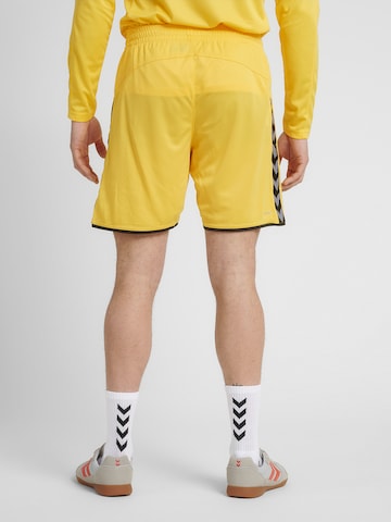 Hummel - Regular Calças de desporto 'Poly' em amarelo