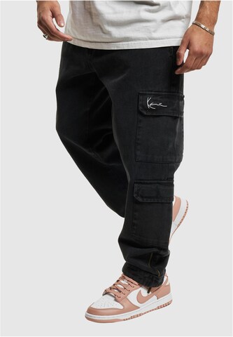 Loosefit Jeans cargo Karl Kani en noir : devant