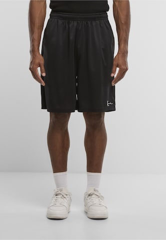 regular Pantaloni di Karl Kani in nero: frontale
