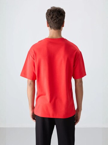 Maglietta di Tommy Life in rosso