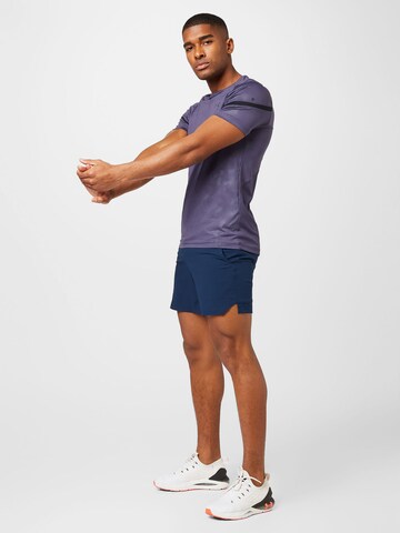 UNDER ARMOUR Normalny krój Spodnie sportowe 'Vanish' w kolorze niebieski