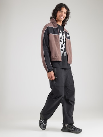 Nike Sportswear Kurtka przejściowa 'CLUB' w kolorze brązowy