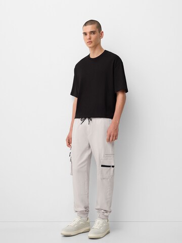 Bershka Tapered Cargo trousers in Grey