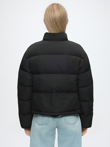 Geacă de iarnă de la Calvin Klein Jeans pe negru