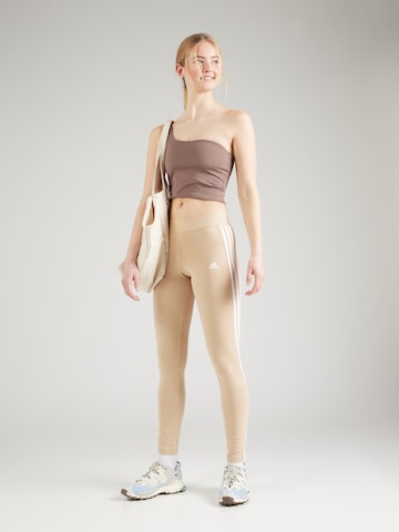 Skinny Pantaloni sportivi 'Essential' di ADIDAS SPORTSWEAR in beige