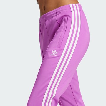 ADIDAS ORIGINALS Slimfit Broek in Lila
