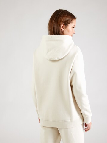 ASICS Sports sweatshirt in Beige