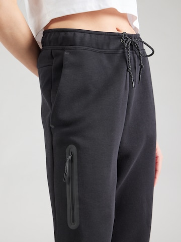 Nike Sportswear Tapered Trousers in Black