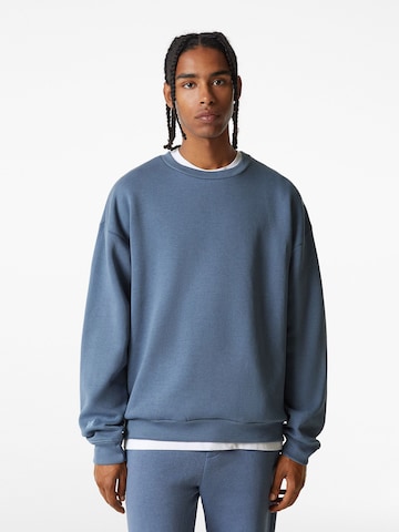 Sweat-shirt Bershka en bleu : devant