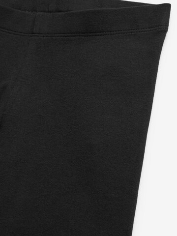 Skinny Leggings di Next in nero