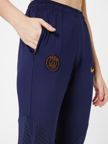 NIKE Slimfit Sportbroek in Blauw