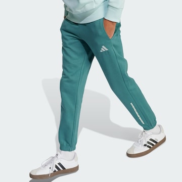 ADIDAS SPORTSWEAR Tapered Sports trousers in Green