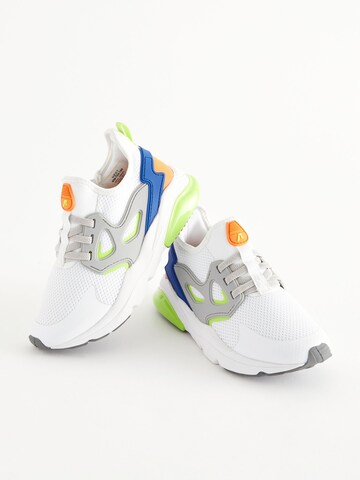 Baskets Next en blanc