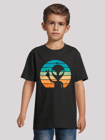 T-Shirt 'Alien Piece Sonnenuntergang' F4NT4STIC en noir : devant