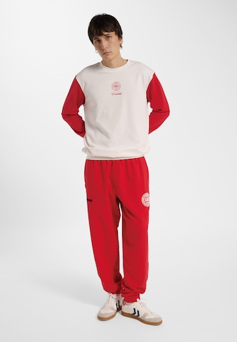 T-Shirt fonctionnel Hummel en blanc