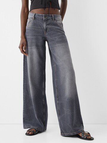Bershka Szeroka nogawka Jeansy w kolorze szary