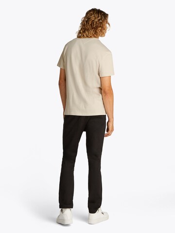 Maglietta di Tommy Jeans in beige