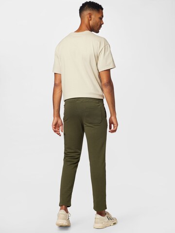 ALPHA INDUSTRIES Tapered Hose 'X-Fit' in Grün