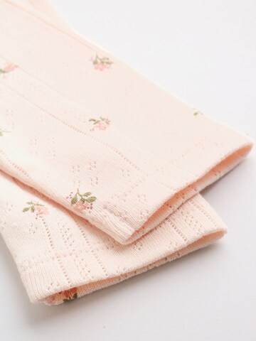 Next - Pijama entero/body en rosa