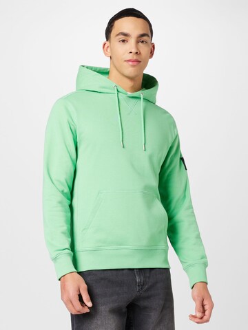 Coupe regular Sweat-shirt Calvin Klein Jeans en vert : devant