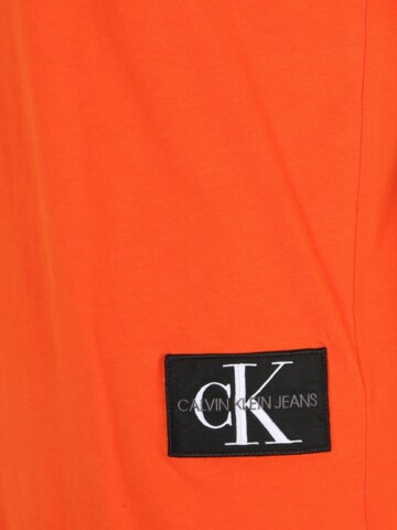 Calvin Klein Jeans Μπλουζάκι σε πορτοκαλί
