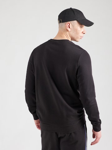 juoda PUMA Sportinio tipo megztinis 'Essentials'