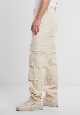 Baggy Pantalon cargo Karl Kani en beige