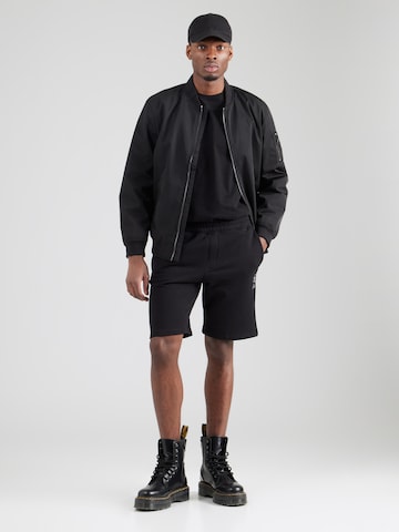regular Pantaloni 'CLOVIS' di GUESS in nero