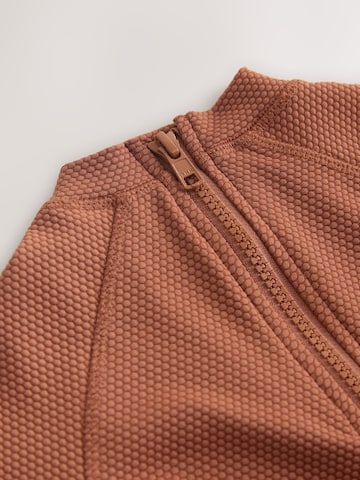 Protecție UV de la Next pe maro