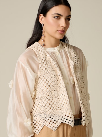 Gilet oltre en beige
