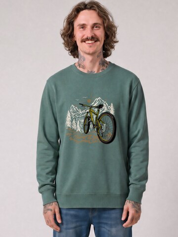 Sweat-shirt 'Mountainbike Und Berge' Watapparel en vert : devant