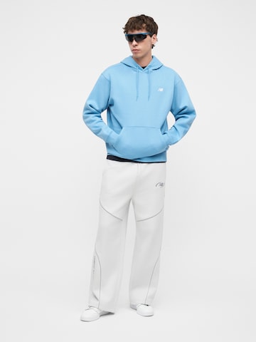 new balance Sweatshirt 'Sport Essentials' in Blauw