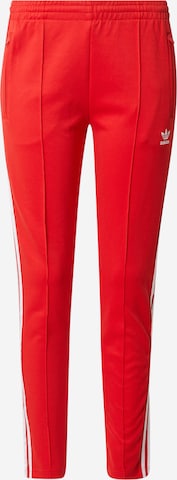 ADIDAS ORIGINALS Pants in Red: front