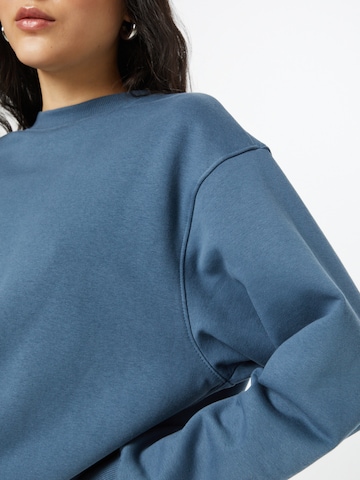 Sweat-shirt 'Amaze' WEEKDAY en bleu