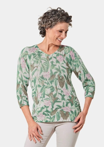 Goldner Pullover in Grün
