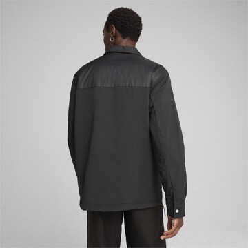 PUMA Sportjacke 'Transeasonal ' in Schwarz