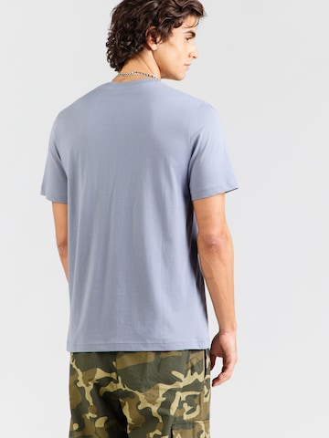 PUMA Toiminnallinen paita 'Essentials No. 1' värissä harmaa