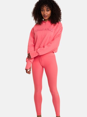 OCEANSAPART Sweatshirt 'Beverly Cropped' in Roze